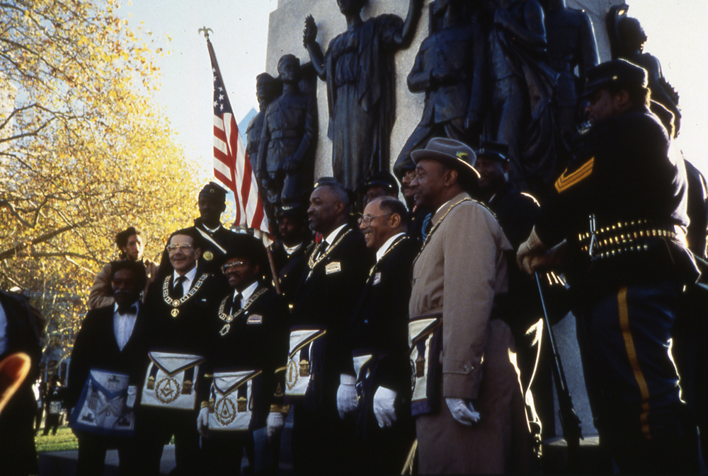 Men in front of the memorial at the rededication in 1994 on the Parkway