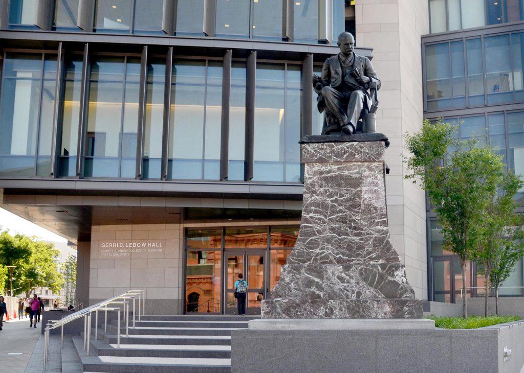 Bronze statue of a seated Anthony Drexel atop a tall granite base