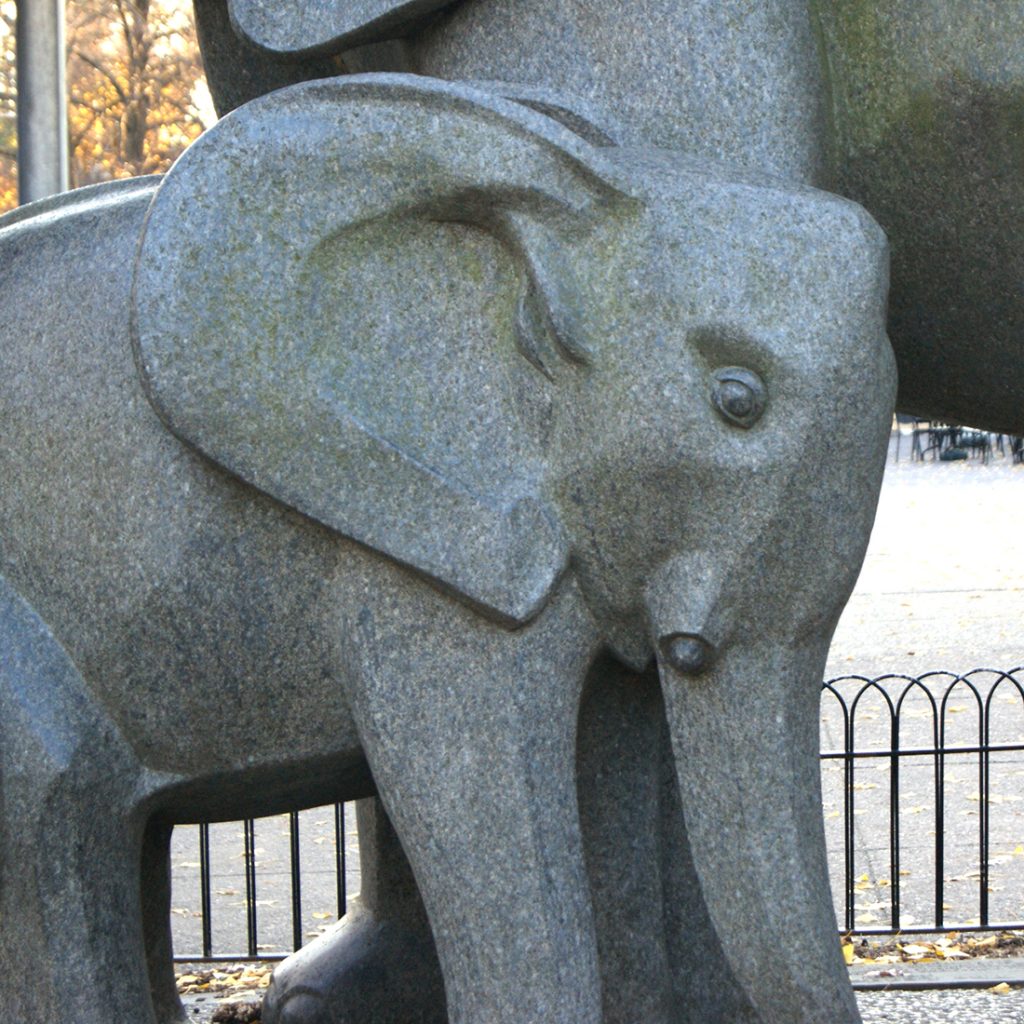 Baby elephant stone sculpture