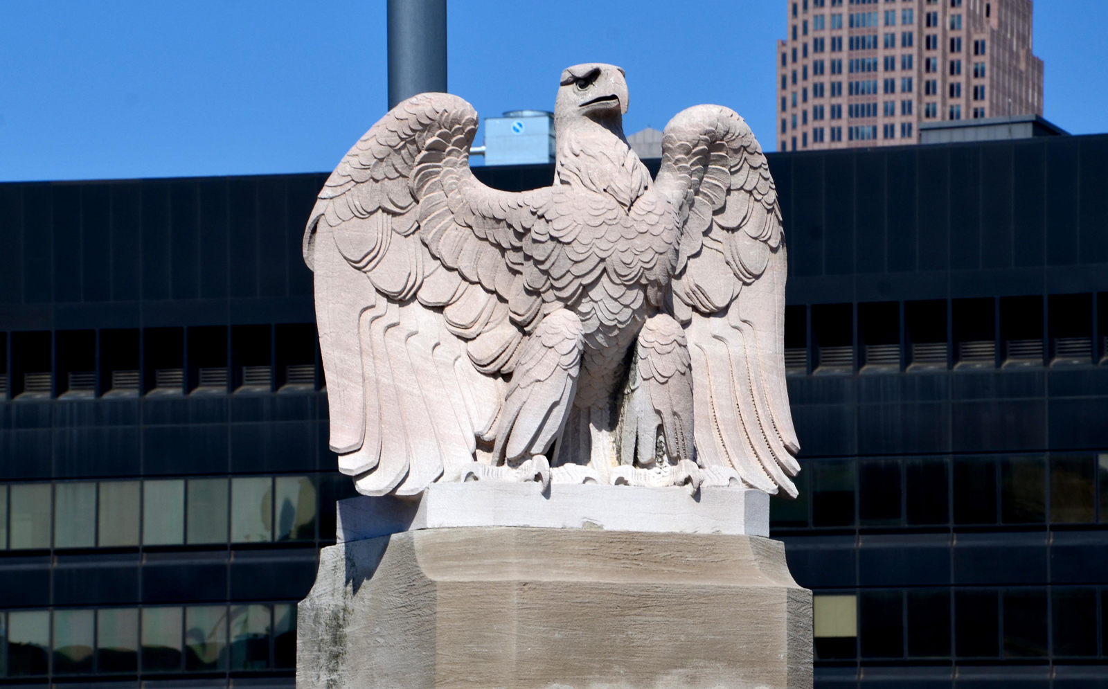 Stone eagle sculpture in the city