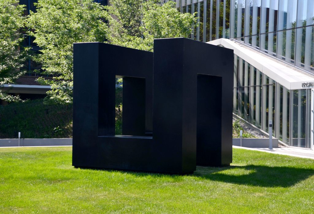 Tony Smith's painted black steel "We Lost" sculpture in grass